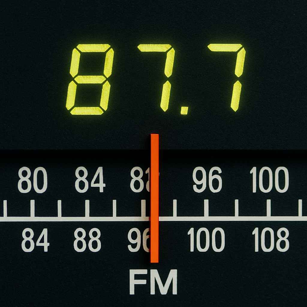 87.7 FM Dial